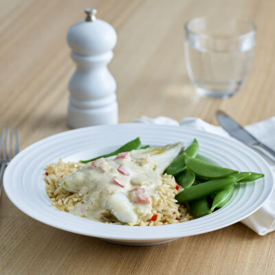 Roast cod, coconut curry sauce, fragrant rice and sugar snap peas
