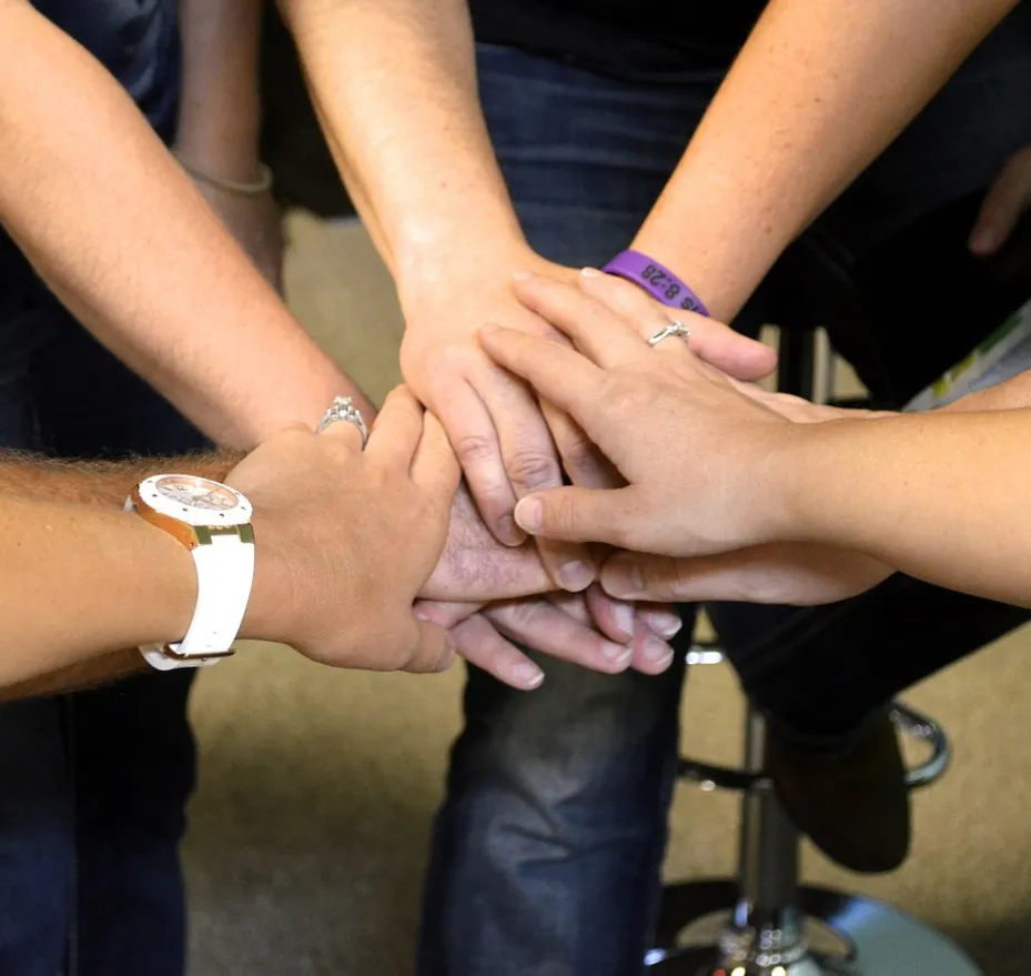 Prayer meeting - holding hands