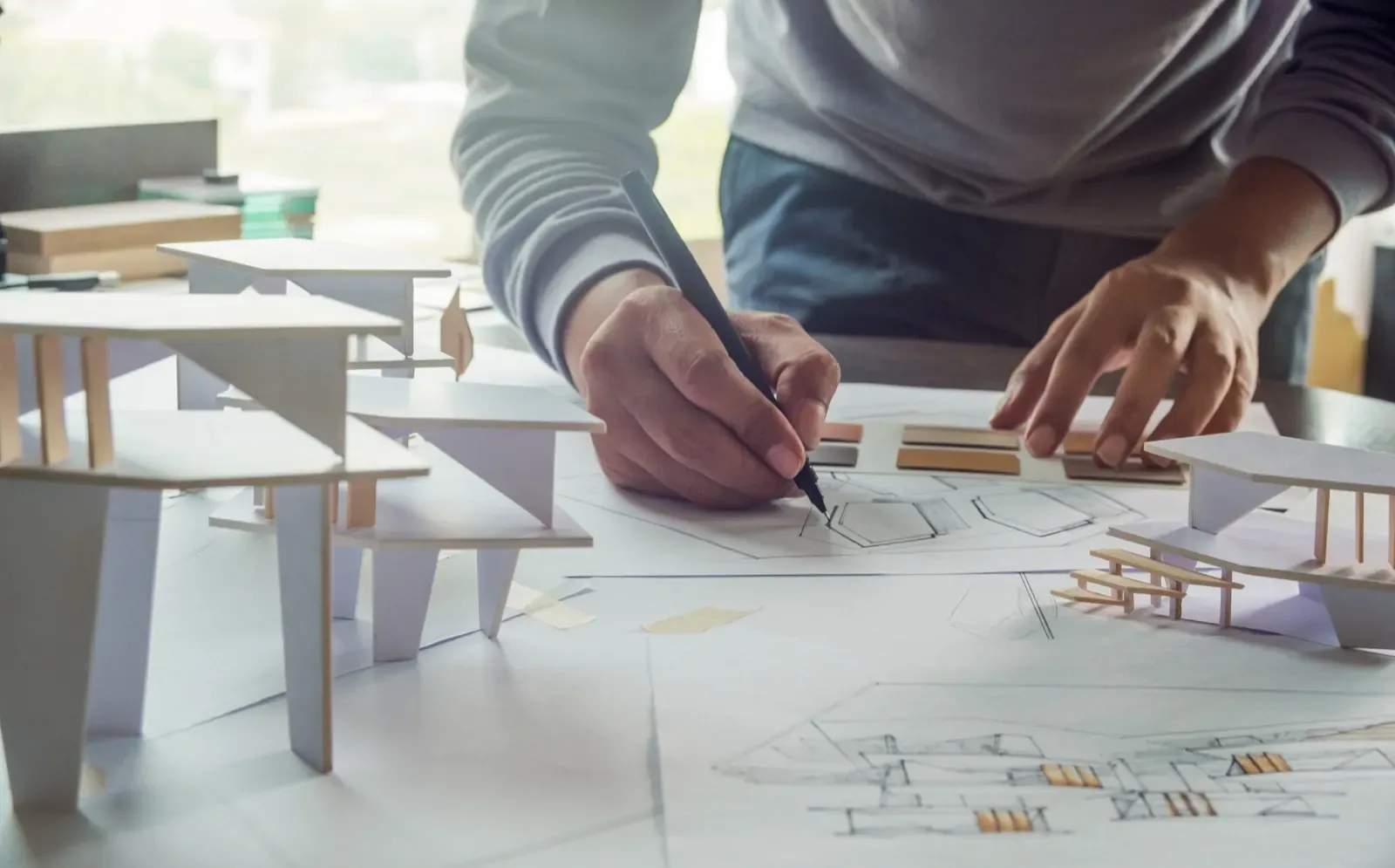 Architect drawing plans