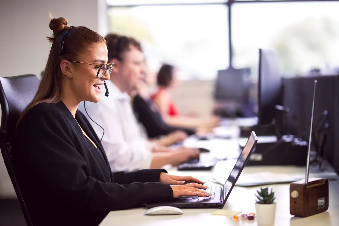 Telesales team working at their desks