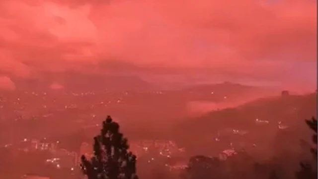 El cielo de Caracas se tiñe de rojo una semana después del sismo letal